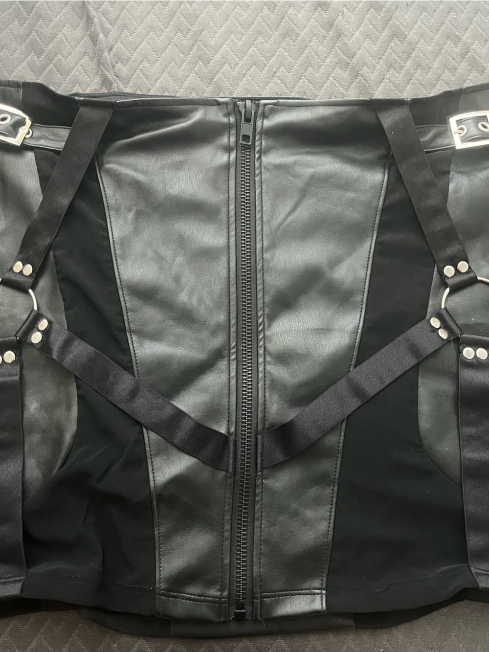 POSTER GIRL Black Faux-Leather Mini Skirt with Strap Details
